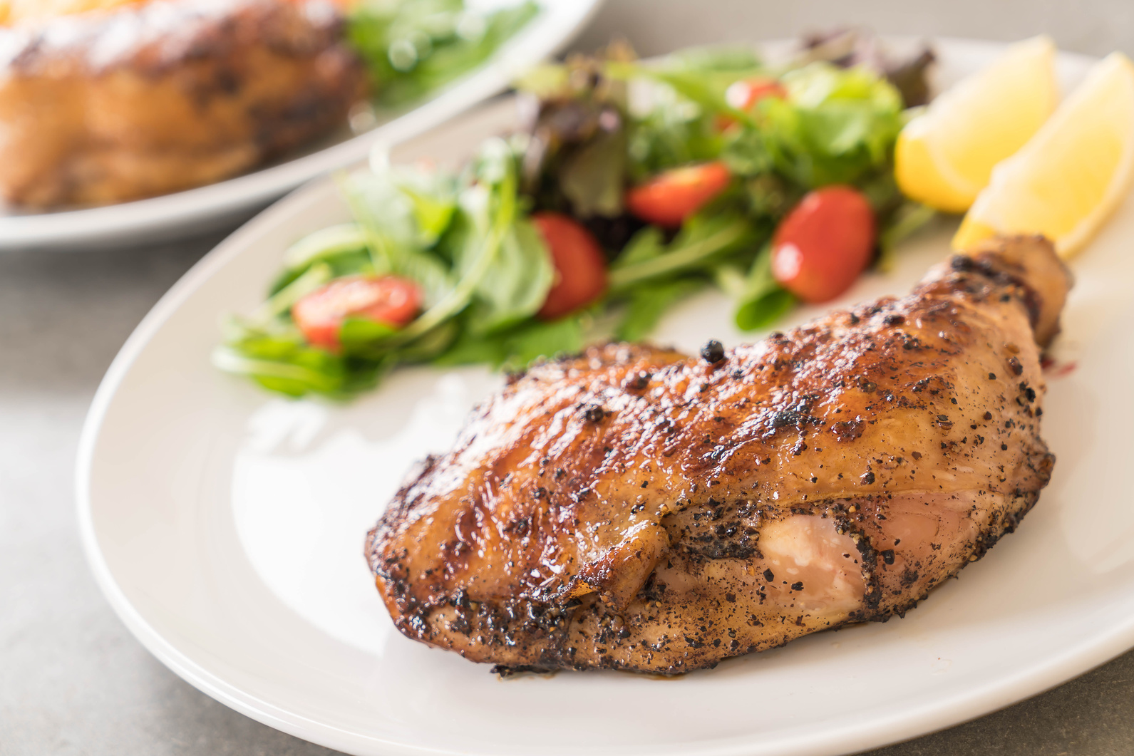 Thigh Chicken Steak with Side Dish in a Plate